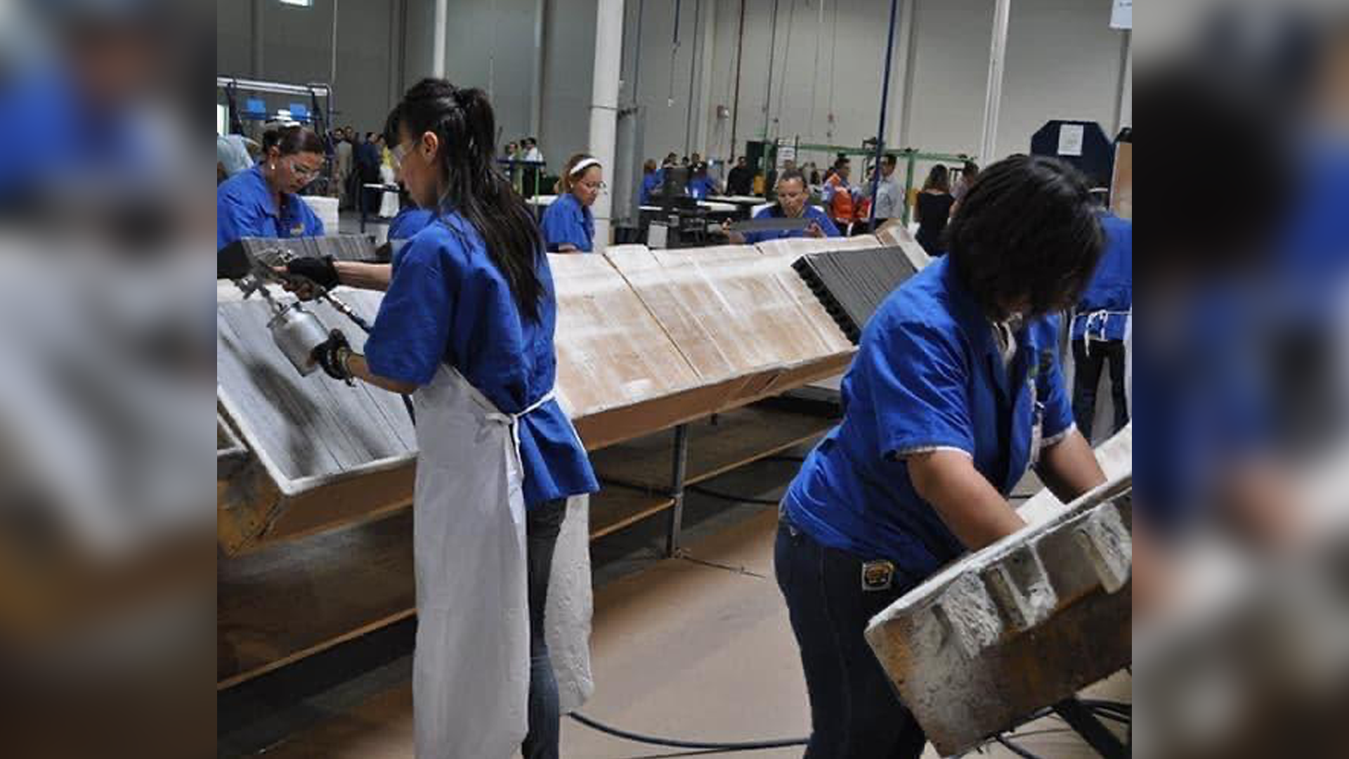 Female workers in a electronics manufacturing facility.
