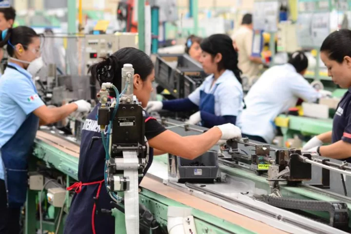 Female workers in an electronics manufacturer.